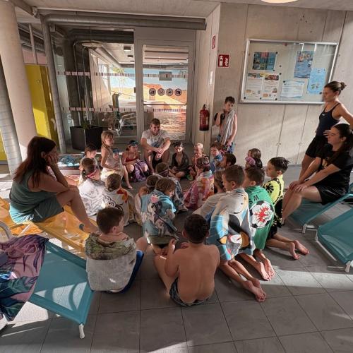 Besprechung mit dem Schwimmtrainer